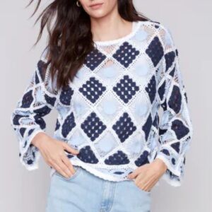 women’s blue and white crochet top